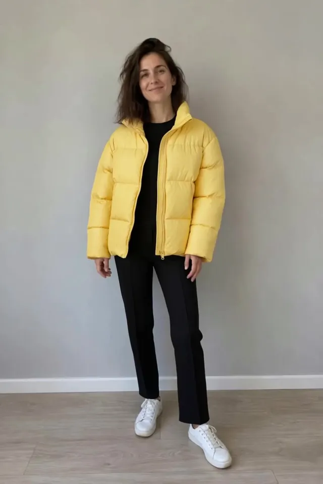 Actual Aisma result: The same turn in a canary-yellow puffer jacket and black pants.