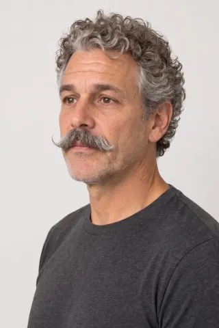 Three-quarter portrait of the same fictional man