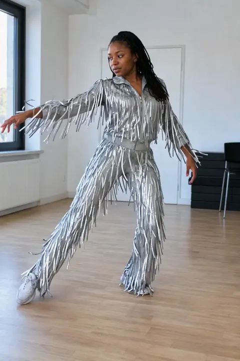 Actual Aisma result: Disco silver outfit on the same fifteen-second room dance. This is a complete real Aisma edit.